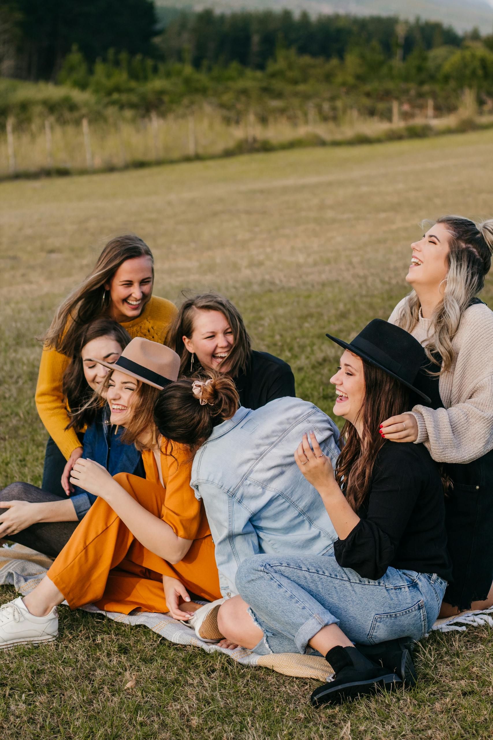Laughing friends having fun on picnic